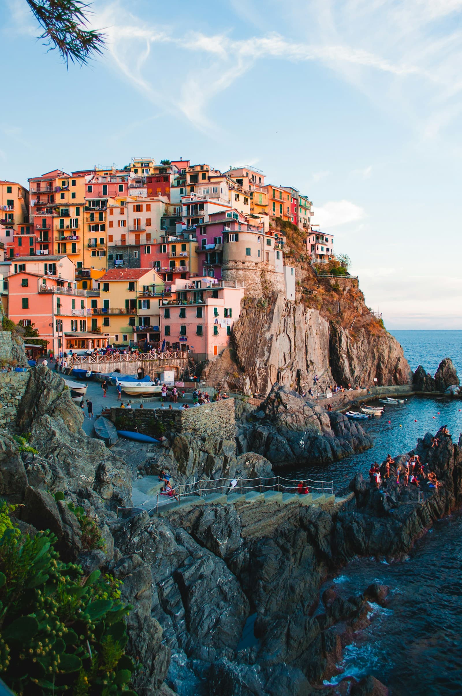 Colourful coastal buildings overlooking a calm Mediterranean harbour